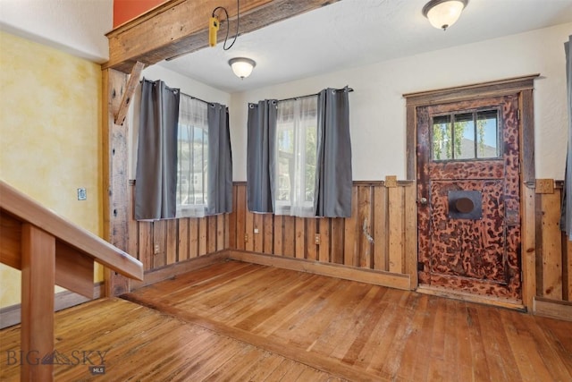 511 Alder St, Anaconda, MT 59711 - spare room with hardwood / wood-style floors, a wainscoted wall, and wooden walls