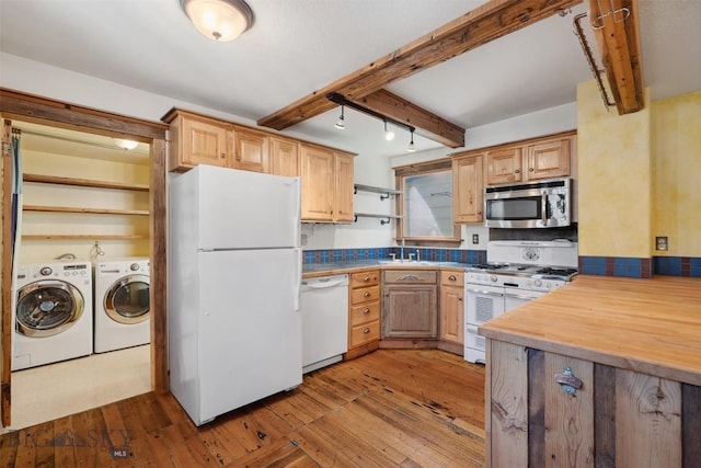 511 Alder St, Anaconda, MT 59711 - kitchen with white appliances, washer and dryer, beamed ceiling, hardwood / wood-style floors, and backsplash