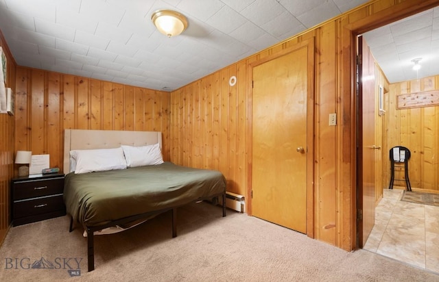 420 N 6th Ave, Bozeman, MT 59715 - bedroom with wooden walls, baseboard heating, and carpet floors