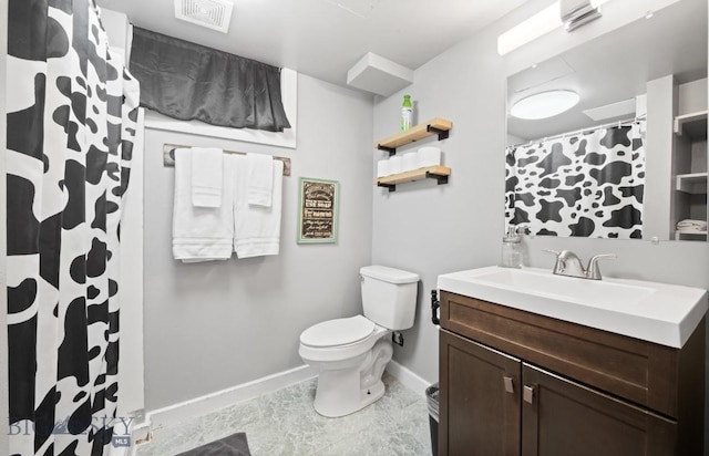 420 N 6th Ave, Bozeman, MT 59715 - bathroom featuring baseboards, vanity, toilet, and curtained shower