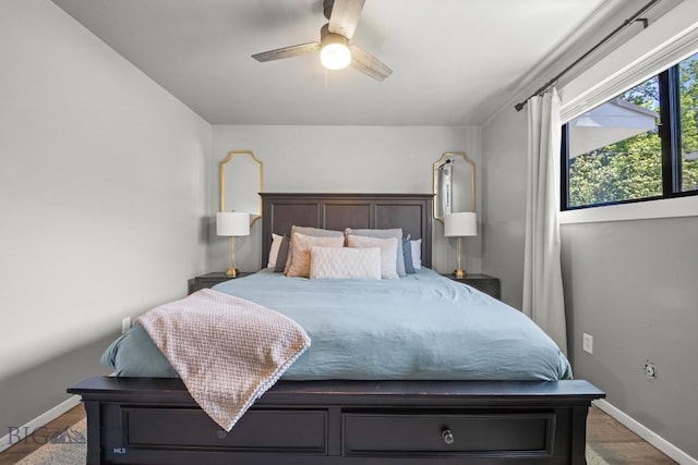 420 N 6th Ave, Bozeman, MT 59715 - bedroom featuring baseboards, a ceiling fan, and wood finished floors