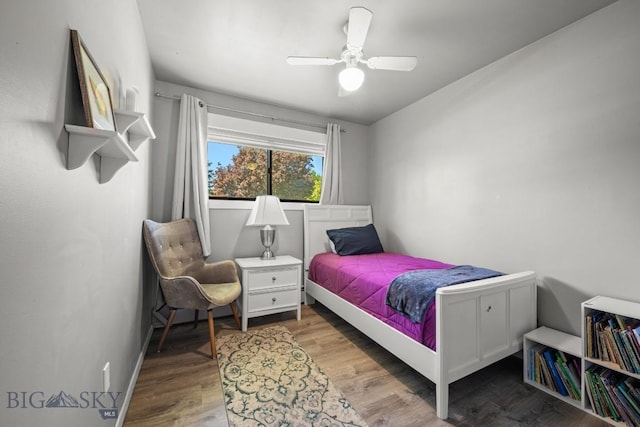 420 N 6th Ave, Bozeman, MT 59715 - bedroom featuring wood finished floors, a ceiling fan, and baseboards