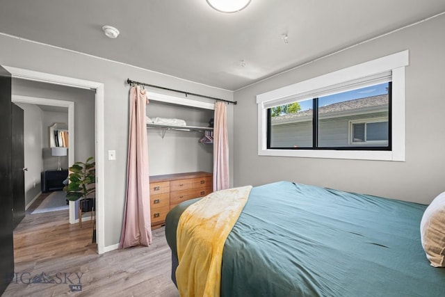 420 N 6th Ave, Bozeman, MT 59715 - bedroom featuring light wood-type flooring, a closet, and baseboards