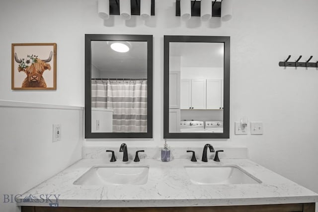 420 N 6th Ave, Bozeman, MT 59715 - full bathroom featuring double vanity and washing machine and clothes dryer