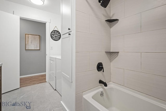 420 N 6th Ave, Bozeman, MT 59715 - bathroom featuring washer and clothes dryer, vanity,  shower combination, and baseboards