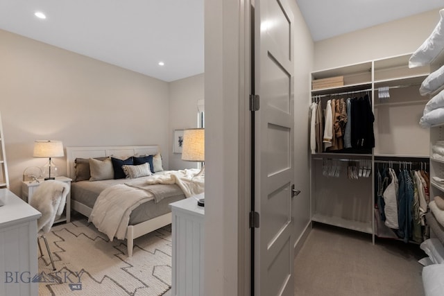 47 Wickwire, Bozeman, MT 59718 - bedroom featuring a closet, recessed lighting, and light carpet