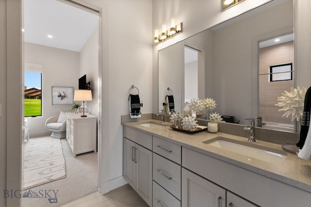 47 Wickwire, Bozeman, MT 59718 - full bath featuring double vanity, healthy amount of natural light, baseboards, and a tub to relax in