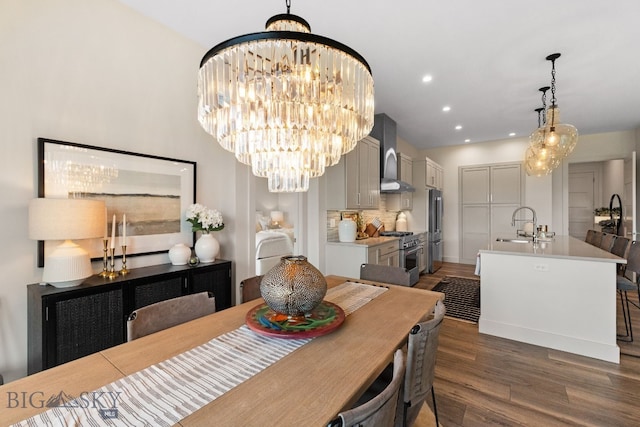 47 Wickwire, Bozeman, MT 59718 - dining area with dark wood finished floors, a chandelier, and recessed lighting