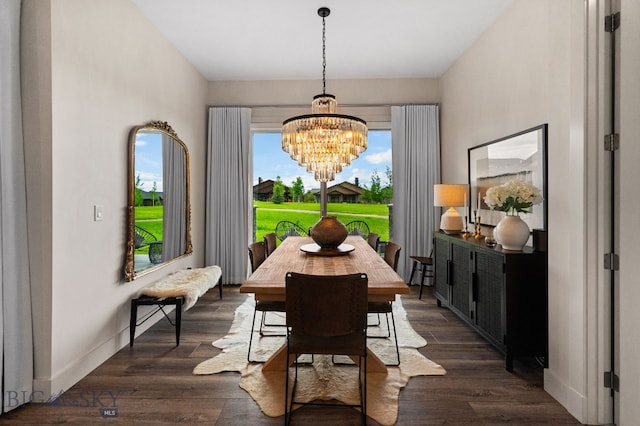47 Wickwire, Bozeman, MT 59718 - dining space featuring a chandelier, dark wood-style flooring, and baseboards