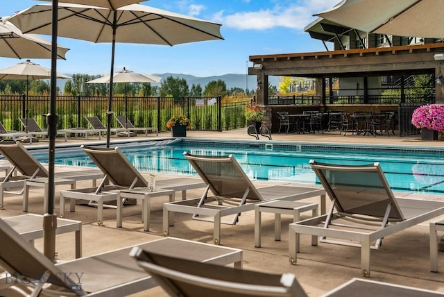 47 Wickwire, Bozeman, MT 59718 - community pool with a mountain view and a patio
