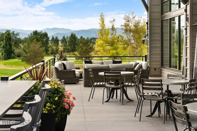 47 Wickwire, Bozeman, MT 59718 - wooden terrace with an outdoor hangout area and a mountain view