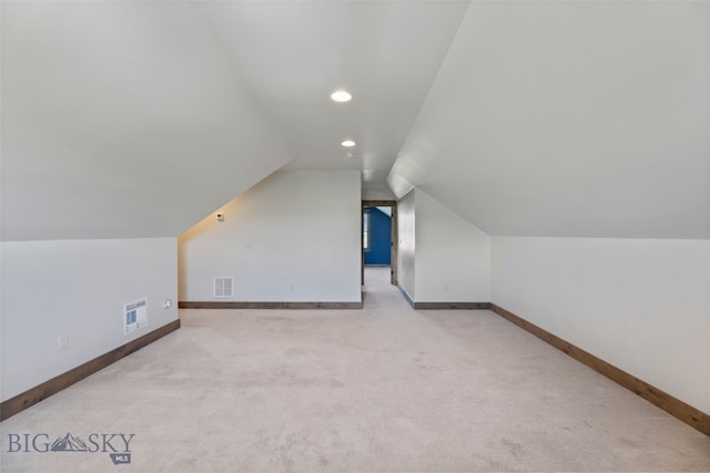 289 Montana Way, Ennis, MT 59729 - additional living space with carpet floors, vaulted ceiling, baseboards, and recessed lighting