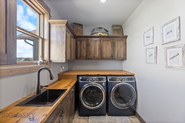 289 Montana Way, Ennis, MT 59729 - laundry area with washer and dryer and cabinet space