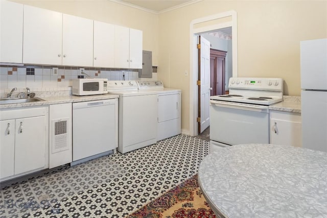 1116-1118 California St, Butte, MT 59701 - kitchen featuring white appliances, a sink, separate washer and dryer, ornamental molding, and light countertops
