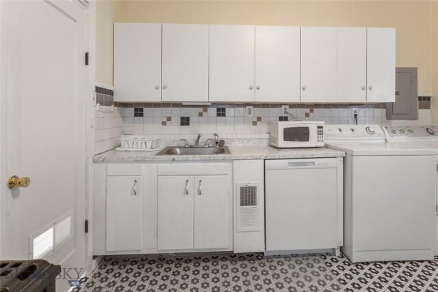 1116-1118 California St, Butte, MT 59701 - laundry room with electric panel, washer and dryer, and light flooring