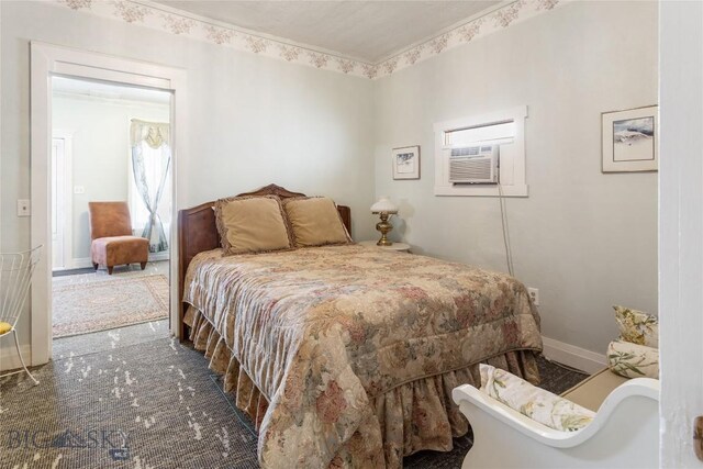 1116-1118 California St, Butte, MT 59701 - carpeted bedroom featuring an AC wall unit and baseboards
