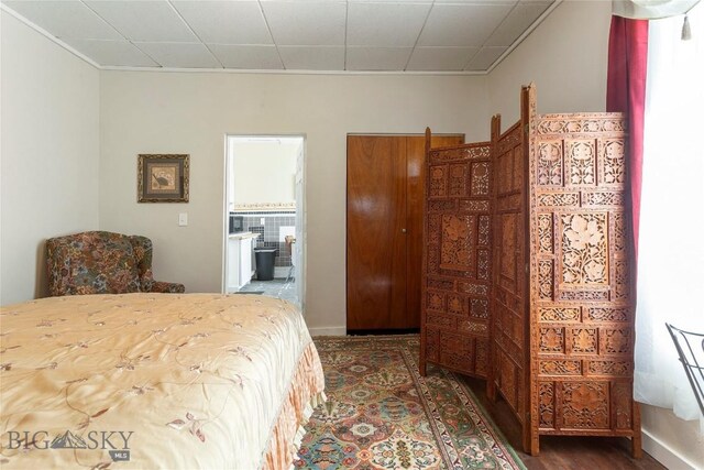 1116-1118 California St, Butte, MT 59701 - bedroom featuring ornamental molding, wood finished floors, and ensuite bathroom