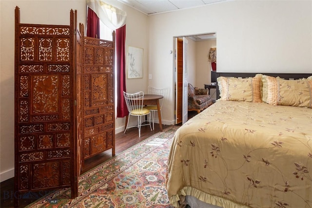 1116-1118 California St, Butte, MT 59701 - bedroom with wood finished floors, baseboards, and ornamental molding