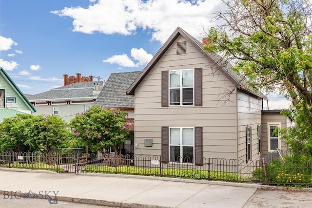 304 W Granite St, Butte, MT 59701 - view of front of house featuring a fenced front yard and a shingled roof