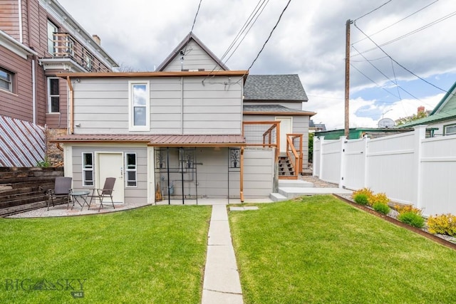 304 W Granite St, Butte, MT 59701 - rear view of house with a patio and a shingled roof