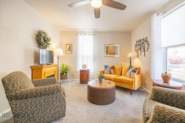 304 W Granite St, Butte, MT 59701 - living area with carpet floors, a ceiling fan, and plenty of natural light