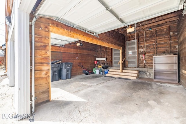 304 W Granite St, Butte, MT 59701 - garage featuring a garage door opener