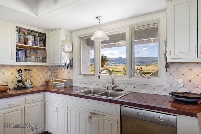 25 Trail Creek Rd, Ennis, MT 59729 - kitchen with dishwasher, a sink, dark countertops, and decorative backsplash
