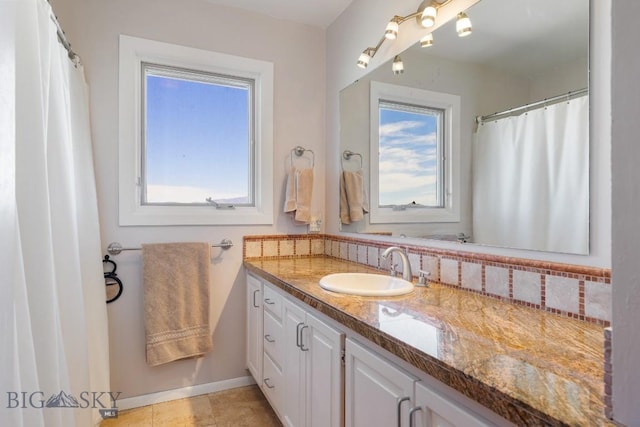 25 Trail Creek Rd, Ennis, MT 59729 - full bath with vanity, backsplash, and baseboards