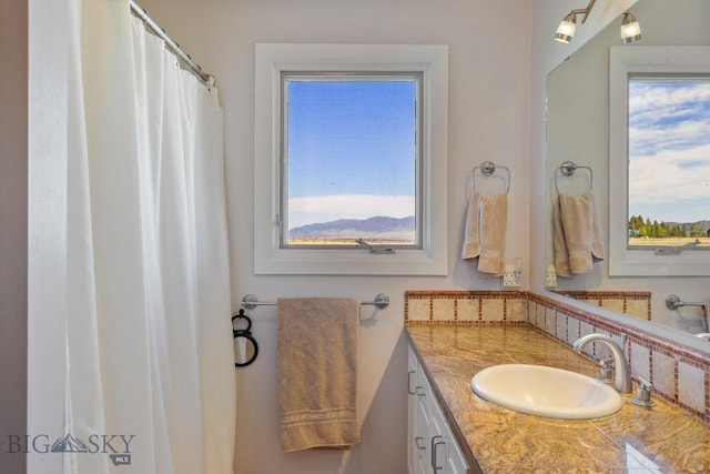 25 Trail Creek Rd, Ennis, MT 59729 - full bath with vanity and tasteful backsplash