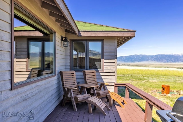 25 Trail Creek Rd, Ennis, MT 59729 - wooden terrace with a mountain view