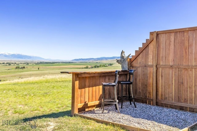 25 Trail Creek Rd, Ennis, MT 59729 - view of green lawn with a mountain view and a view of rural / pastoral area