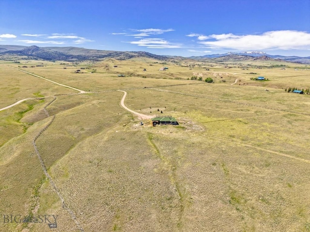 25 Trail Creek Rd, Ennis, MT 59729 - aerial view of sparsely populated area with a mountainous background