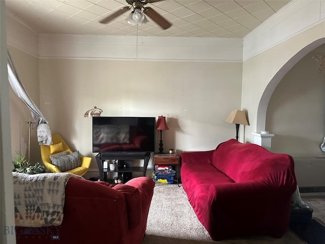 905 W Copper, Butte, MT 59701 - living room with arched walkways, a ceiling fan, carpet, and ornamental molding