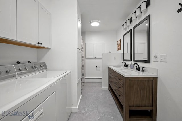 420 N 6th Ave, Bozeman, MT 59715 - laundry area featuring separate washer and dryer, light marble finish floors, a baseboard radiator, and baseboards