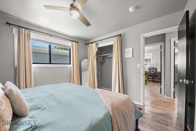 420 N 6th Ave, Bozeman, MT 59715 - bedroom featuring wood finished floors, baseboards, a closet, and a ceiling fan