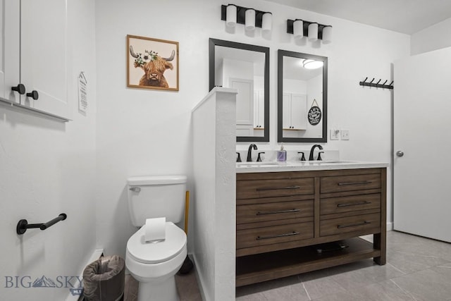 420 N 6th Ave, Bozeman, MT 59715 - bathroom with double vanity, toilet, and tile patterned floors