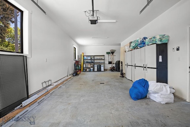 420 N 6th Ave, Bozeman, MT 59715 - garage featuring a garage door opener