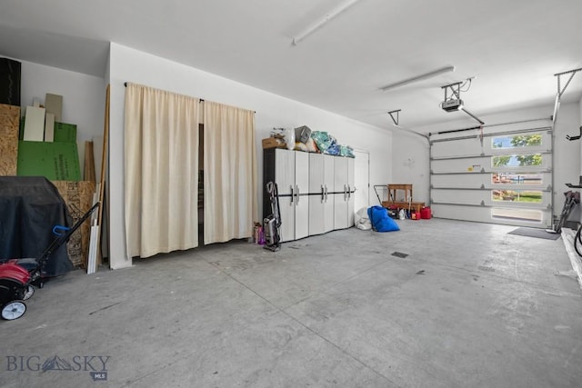 420 N 6th Ave, Bozeman, MT 59715 - garage featuring a garage door opener