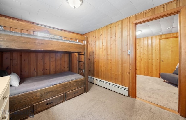 420 N 6th Ave, Bozeman, MT 59715 - carpeted bedroom with a baseboard heating unit and wooden walls