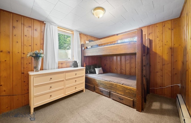 420 N 6th Ave, Bozeman, MT 59715 - bedroom with a baseboard heating unit, carpet flooring, and wooden walls