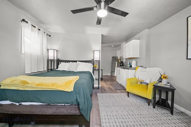 420 N 6th Ave, Bozeman, MT 59715 - bedroom featuring wood finished floors, baseboards, and ceiling fan