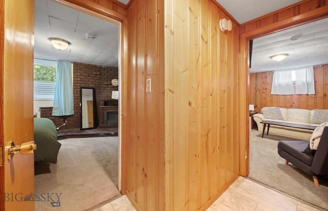 420 N 6th Ave, Bozeman, MT 59715 - hall featuring light colored carpet, wood walls, and light tile patterned flooring