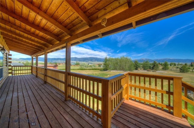 13 Coachman Ln, Mcallister, MT 59740 - wooden terrace with a mountain view and a view of rural / pastoral area