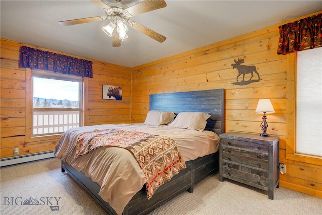13 Coachman Ln, Mcallister, MT 59740 - bedroom with carpet flooring, baseboard heating, wood walls, and a ceiling fan
