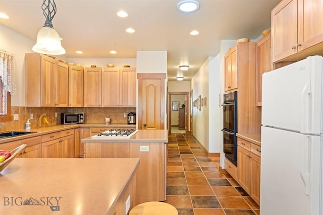 510 N 23rd, Bozeman, MT 59718 - kitchen with white appliances, light brown cabinets, a kitchen island, tasteful backsplash, and a sink