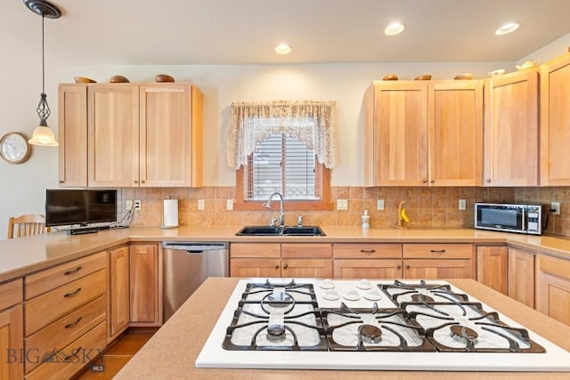 510 N 23rd, Bozeman, MT 59718 - kitchen featuring light brown cabinets, a sink, appliances with stainless steel finishes, light countertops, and recessed lighting