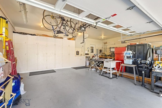 510 N 23rd, Bozeman, MT 59718 - garage with a workshop area and a garage door opener