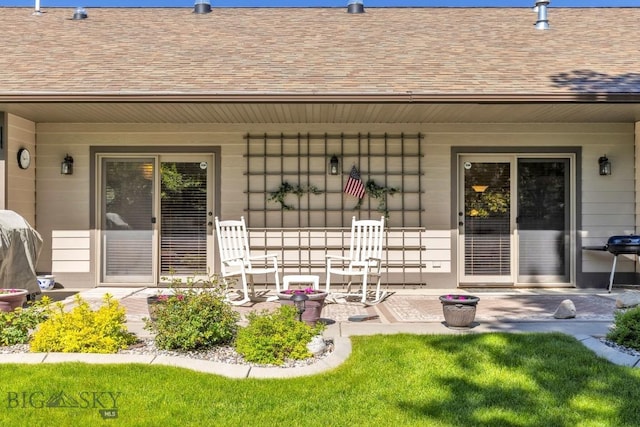 510 N 23rd, Bozeman, MT 59718 - view of exterior entry featuring a porch and roof with shingles