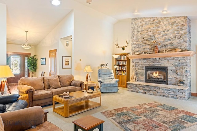 510 N 23rd, Bozeman, MT 59718 - living area with carpet flooring, a fireplace, and high vaulted ceiling