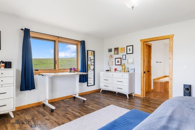 56 Trails End, Livingston, MT 59047 - bedroom with dark wood-type flooring and baseboards